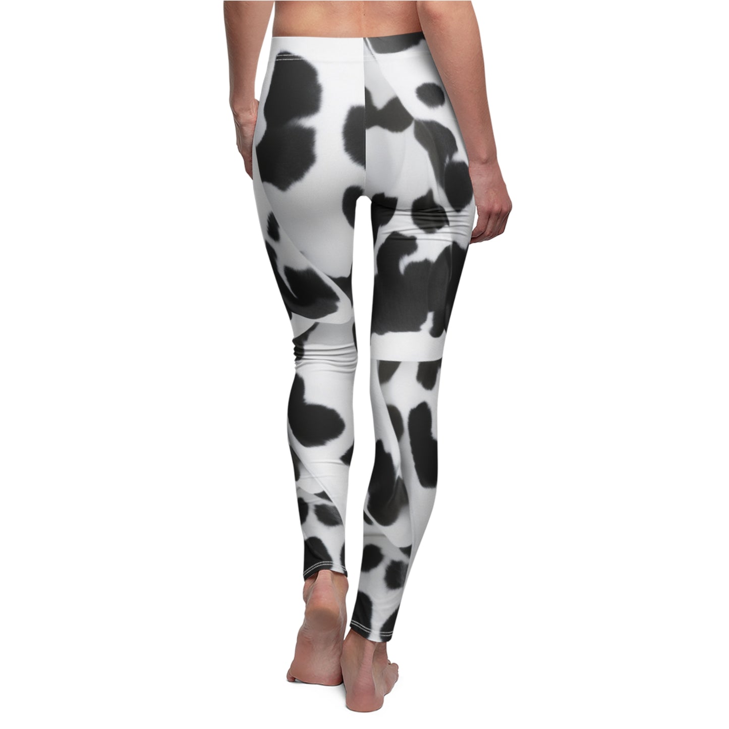 Trendy Chic Folded Black & White Cow Print Leggings - Skinny Fit Yoga Pants, Perfect for Fashion Forward Individuals and Animal Print Lovers